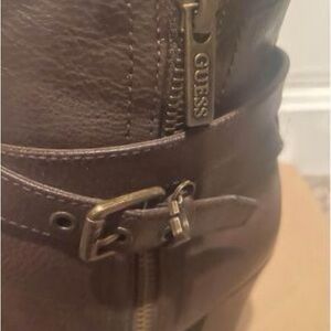 Guess brown heeled boots with lining.